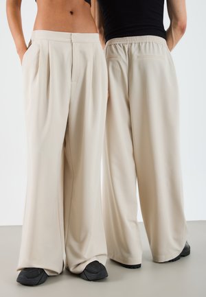 UNISEX - Pantaloni - stone