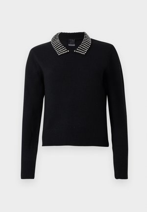 Must mustriga mustre, millel on pikad varrukad, kaunistatud dekoratiivsete studidega kraega. Ribiga ääred ja mansetid, klassikaline lõige. Ilma mustriteta.