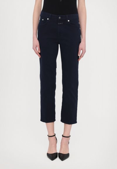 Navy cropped jeans with a fitted design, featuring front pockets and a button closure. Smooth texture with subtle stitching details.