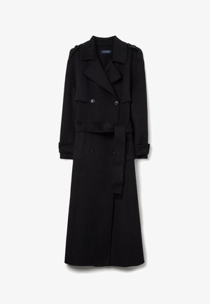 Manteau long en laine noire avec des boutons doublés, col cranté, taille ceinturée et épaulettes, présentant une silhouette épurée et bien ajustée.