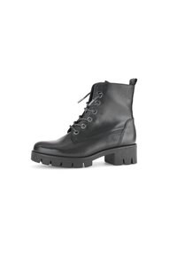 Zwarte leren enkelboot met een ronde neus, vetersluiting aan de voorkant en een chunky, gestructureerde zool. Voorzien van versterkte stiksels en een trekloop.