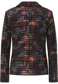 Villakangas ruudullinen bleiseri tummanvihreänä, laivastonsinisenä ja ruosteen värisenä; jossa on kauluksen leikattu muoto, jämäkkä rakenne ja napilliset hihansuut.