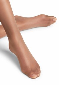 Transparente, hautfarbene Feinstrumpfhose mit Fuß, glatter Textur, offenem Zehendesign, dezentem Hautton-Abgleich, ausgestattet mit verstärktem Zehenbereich für Haltbarkeit.