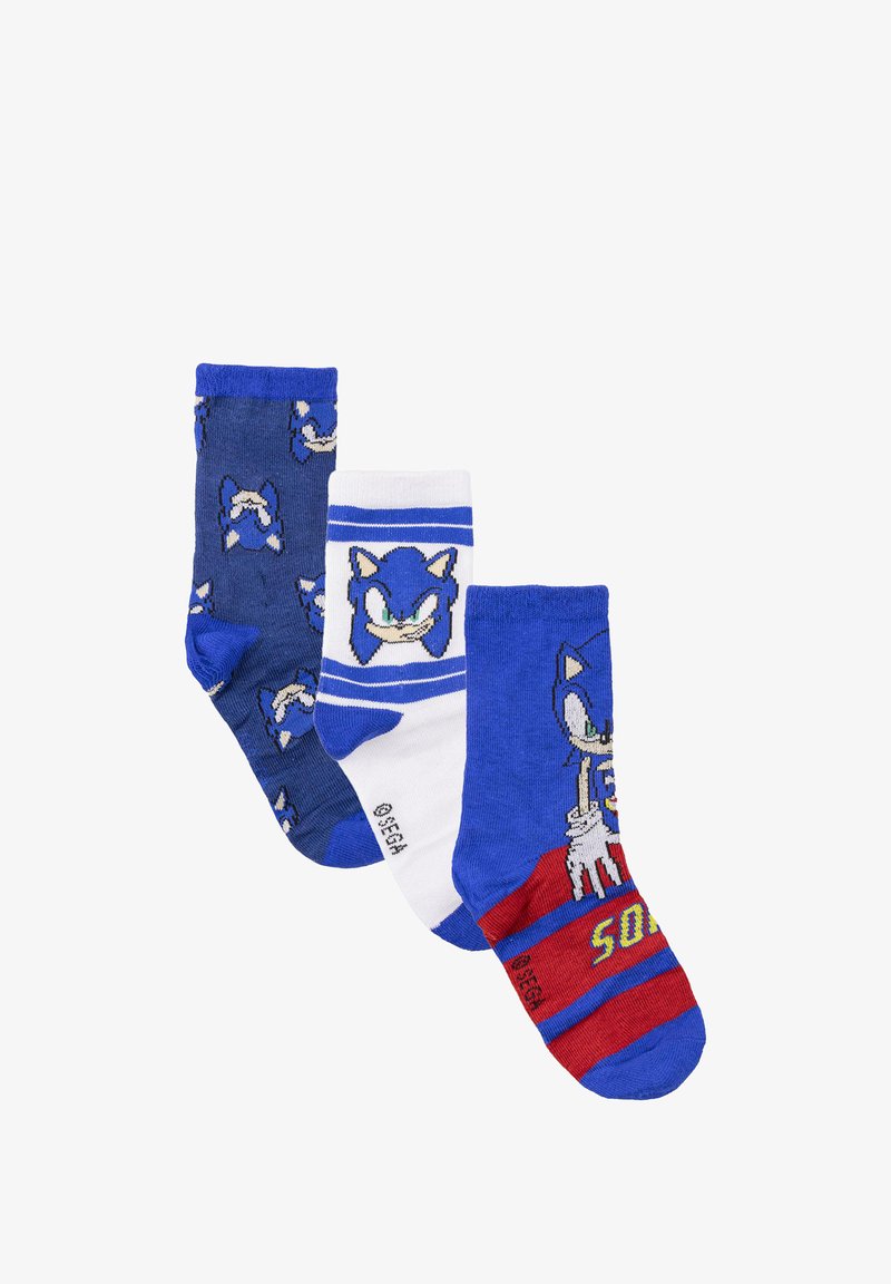 Tre paia di calzini con tonalità di blu. Un paio presenta il volto di Sonic, un altro ha uno sfondo bianco con righe blu, e l'ultimo è rosso con una grafica e righe.
