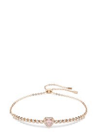 Hjärta-formad armband med en rosa stencenter, omgiven av klara kristaller, på en delikat roséguldig kedja med justerbar lås.