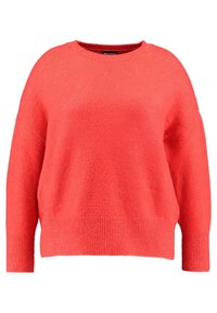 Korallfarbener Pullover, lockere Passform, runder Ausschnitt, Rippbündchen am Saum und an den Ärmeln, weicher Textilstoff, verlängerte Ärmel mit überschnittenen Schultern.