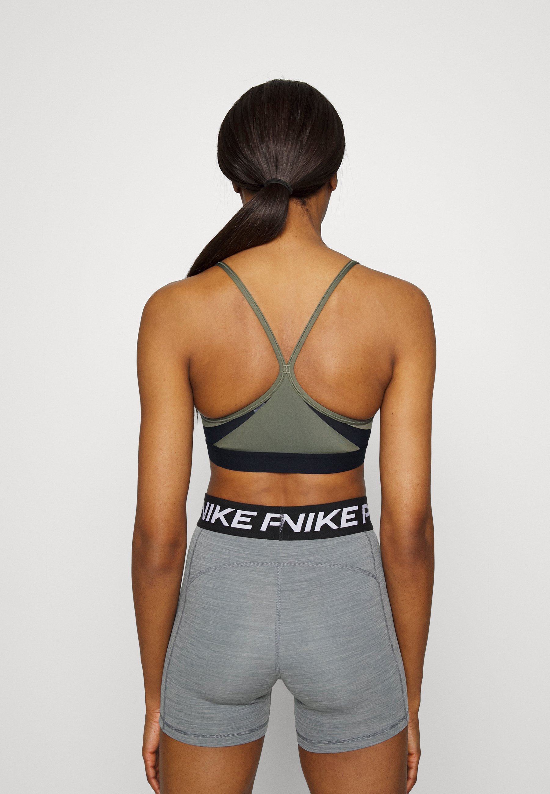 Nike Performance INDY BRA V-NECK - Light support sports bra - medium  olive/black/white/khaki - Zalando.co.uk