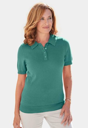 Polo shirt turquoise à manches courtes en tissu tricoté, doté d'un col classique et d'une patte de boutonnage à quatre boutons assortis.