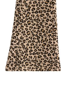 Leopard print fabric featuring a beige background with black and brown spots, soft texture, and stitched hem details.