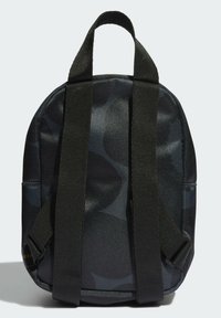 Black camo-patterned backpack made of durable material, featuring two black webbed straps and a top handle for carrying.