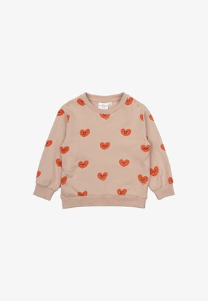 Light beige sweatshirt made of soft fabric, featuring an all-over pattern of smiling orange hearts. Ribbed cuffs and neckline.