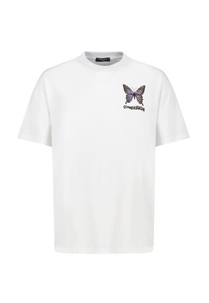 White cotton T-shirt with short sleeves, featuring a butterfly design and the word "COMPASSION" in black below the graphic.