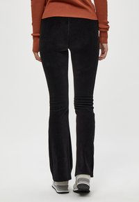 Desires DEBRITT FLARED LEGGINGS - Broek - black