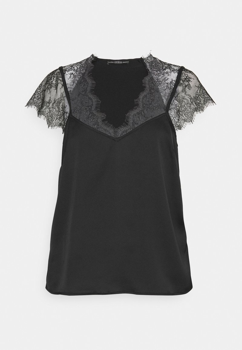 Haut noir sans manches avec délicates manches en dentelle noire en forme de petites ailes et un décolleté en V. Tissu lisse avec une légère brillance et des détails raffinés en dentelle.