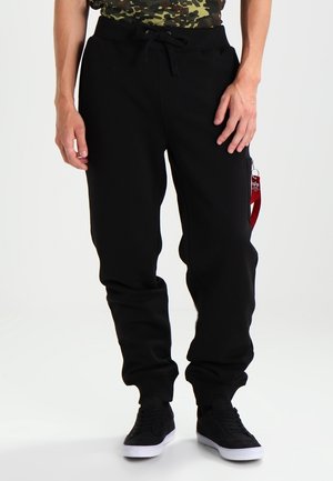 Pantalones deportivos - black