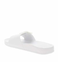 Sandalo bianco slide realizzato in materiale gommoso liscio, design open toe e dettaglio a taglio rotondo vicino al centro. Suola piatta e forma minimalista.