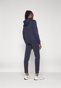 Champion ICONS RIB CUFF PANTS  - Spodnji deli trenirk - dark blue