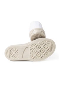 Canvas sneaker with a white upper, beige rubber sole, textured with geometric patterns and reinforced toe. Simple and functional design.