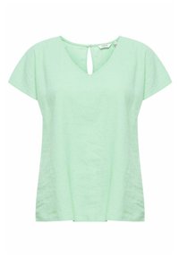Haut vert menthe à manches courtes avec un décolleté en V et un détail en forme de trou à l'arrière, fabriqué à partir d'un tissu léger avec une finition légèrement texturée.
