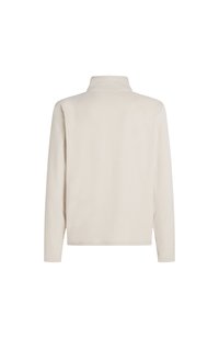 Pullover in pile beige con colletto alto, maniche lunghe e una superficie liscia. Nessun hardware visibile o modelli sul retro.