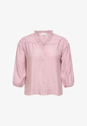 Blusa rosa chiaro con maniche a tre quarti, scollatura a V, colletto arricciato e ricami decorativi sulle spalle. Chiusura frontale con bottoni.