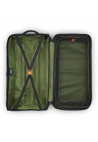 Valigia nera con un interno a motivi verdi. Presenta cinghie incrociate e una tasca in rete con zip. Include una maniglia e accessori con zip di colore arancione brillante.