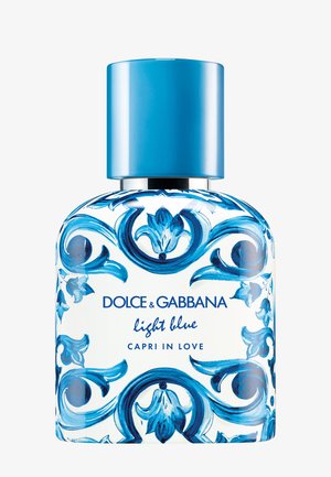 Flacon de parfum en verre transparent avec des motifs floraux bleus et un bouchon bleu uni, étiqueté Dolce & Gabbana Light Blue Capri in Love.