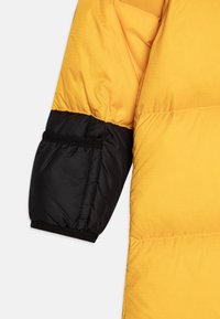 The North Face BABY RETRO NUPTSE ONE PIECE UNISEX - Overall - summit gold