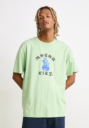 Carhartt WIP TYRE - Print T-shirt - charm green