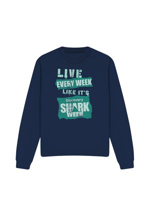 Navy blue sweatshirt with text "Live Every Week Like It's Discovery Shark Week" in distressed green and white font on front.