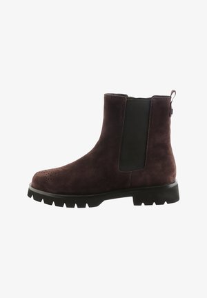 Ankle boot made of brown suede with elastic side panels, rounded toe, textured sole, and rear pull tab for easy wear.