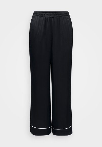 Svarta vida byxor i mjuk tyg, med elastiskt midjeband och en vit accent vid fållen. Slät textur med en enkel design.