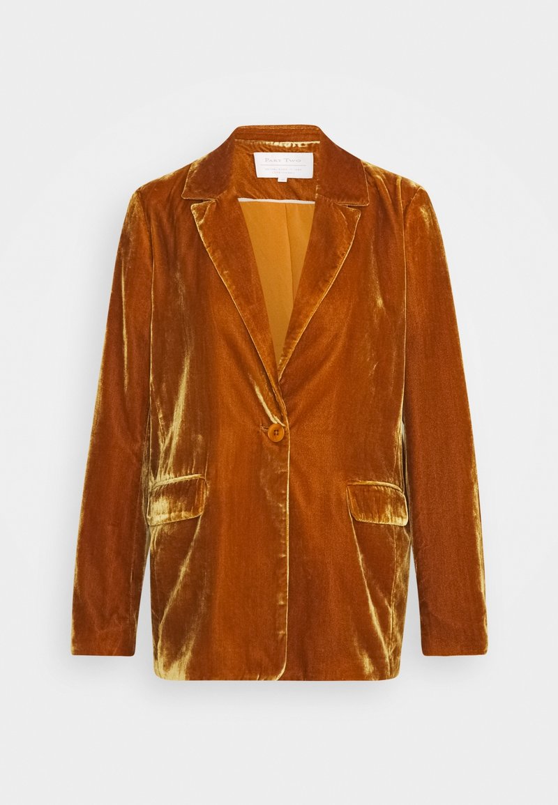 Blazer en velours dans une teinte orange-brun chaude. Il présente un col cranté, une fermeture à un bouton et deux poches avant. Texture lisse.