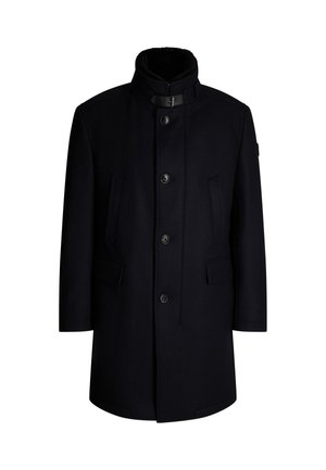 Marineblauwe wollen jas met hoge kraag, dubbelgeknoopte ontwerp, vier voorzakken en gestructureerde stof. Inclusief zwarte hardware accenten.