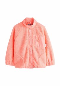 Barackszínű polárdzseki magas gallérral, patentos záródással, elasztikus mandzsettákkal és kontrasztos anyagból készült bal oldali mellzsebbel.