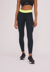 Nike Performance Tights - black/yellow