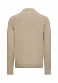 Beige knitted sweater with a crew neck, ribbed cuffs, and hem, featuring a smooth texture and subtle seam detailing along the shoulders.