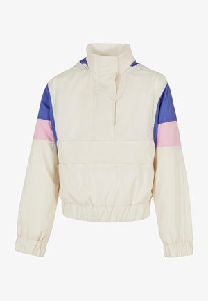 Giacca leggera color crema con design a blocchi di colore; presenta accenti blu, rosa e viola, colletto alto e polsini e orlo elasticizzati.