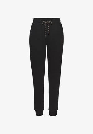 Schwarze Jogginghose aus weichem Stoff mit elastischem Taillenzug und Kordelzug. Schmal zulaufende Beine ohne sichtbare Muster oder Akzente.