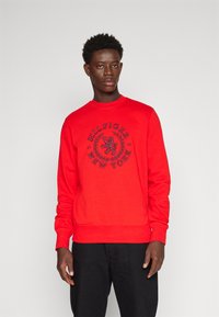 Tommy Hilfiger BIG ICON CREST Sweatshirt fierce red/red