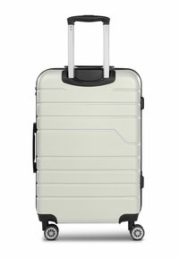 Valigia rigida di colore grigio chiaro con dettagli neri, dotata di manico telescopico, quattro ruote e pattern orizzontali a scanalatura.