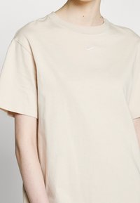 Nike Sportswear Žerzejové šaty - beige