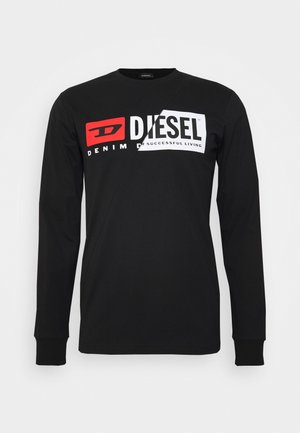 Chemise noire à manches longues avec couture diagonale et logo "DIESEL DENIM" en rouge et blanc sur la poitrine.