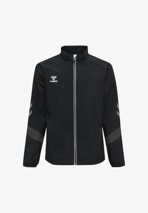 Black full-zip sports jacket with white zipper, gray chevron stripes on sleeves, and white hummel logo on the chest.