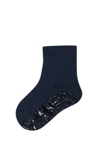 Navy blue ankle sock with a ribbed cuff, textured rubber grip patterns on the sole, and a smooth knit finish.