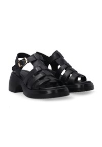 Black leather sandals with a braided design, open-toe, and adjustable buckle. Features a chunky heel and textured rubber sole for grip.