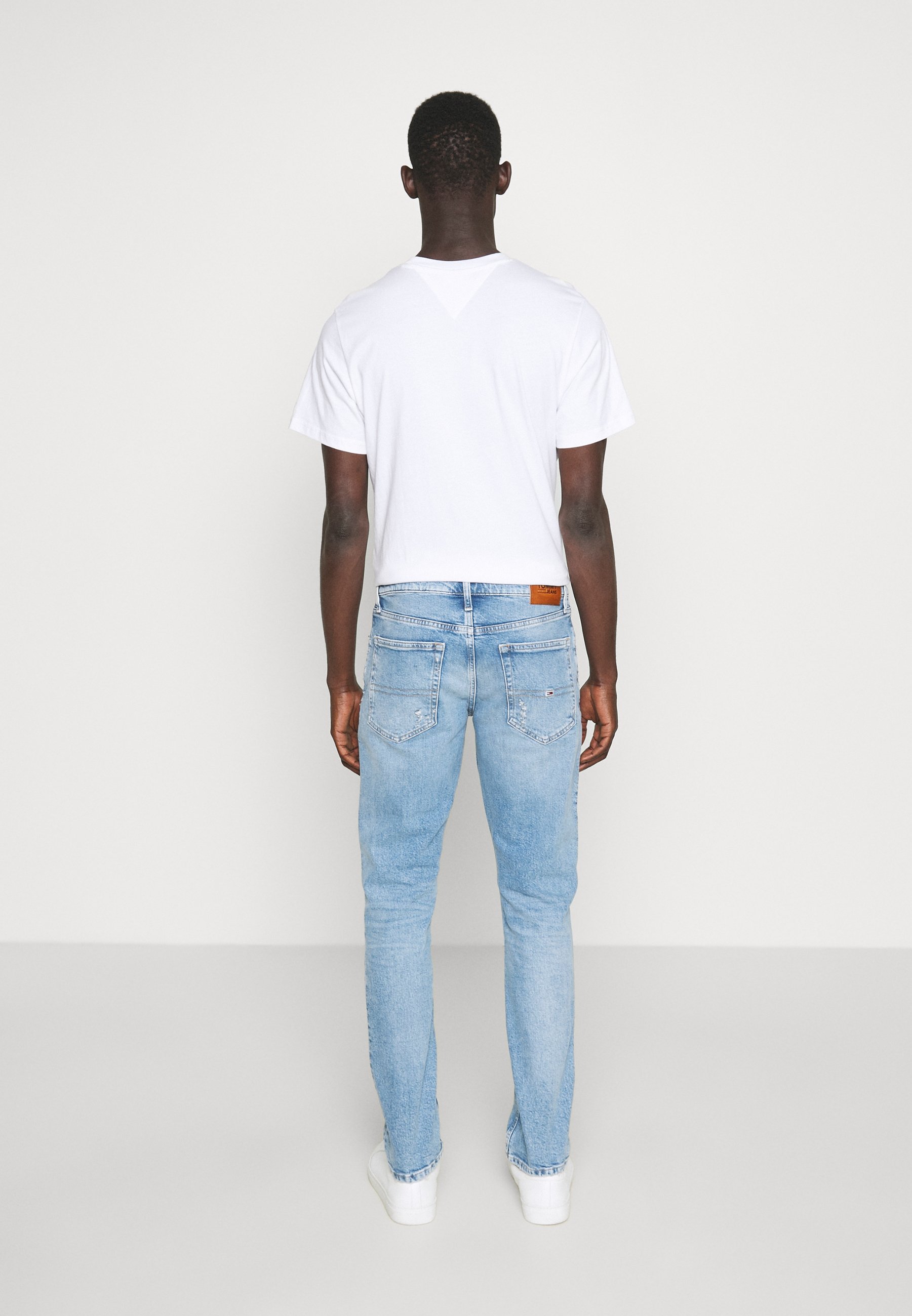Tommy Jeans SCANTON SLIM - Prigludę džinsai - denim light/šviesiai mėlyno  džinso - Zalando.lt