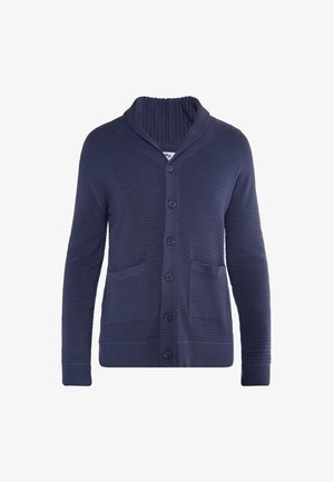 Gilet bleu marine avec un motif texturé, col châle, six boutons et deux poches avant. Poignets et ourlet côtelés.