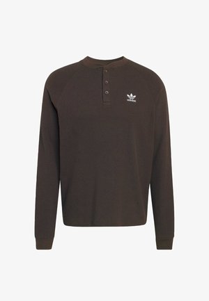 Brown long-sleeve henley shirt, textured fabric with three buttons at the neckline, features white adidas logo on the left chest.