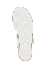 Semelle de sandale blanche avec un motif texturé, dotée d'une semelle extérieure en caoutchouc et de accents marron clair au talon et sur le bord supérieur.